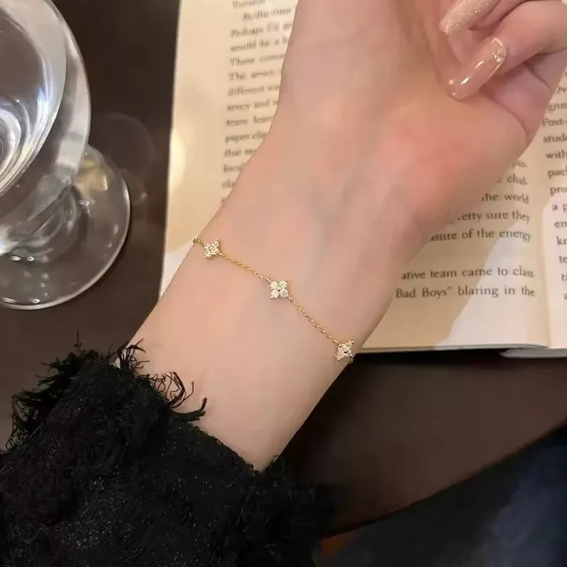 Crystal Four-Leaf Clover Gold Stainless Steel Bangle